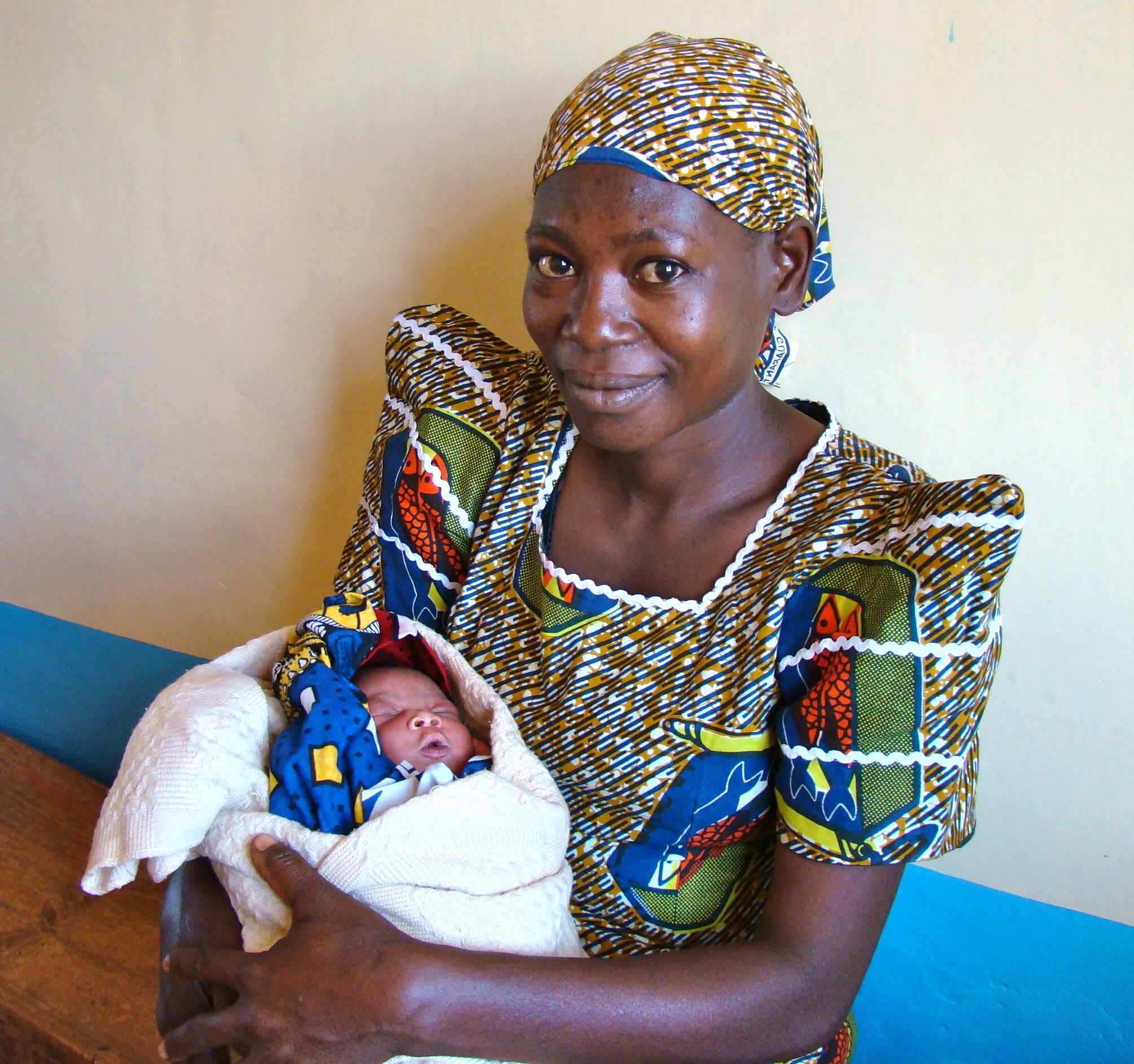 Mother holding newborn baby